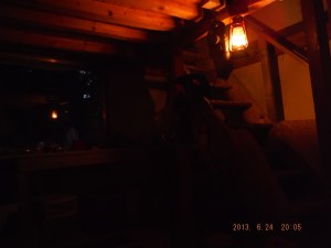 06-24 nice cool evening and tent cabin is in one piece. The stairs were made from a single forked tree and a chain saw. 