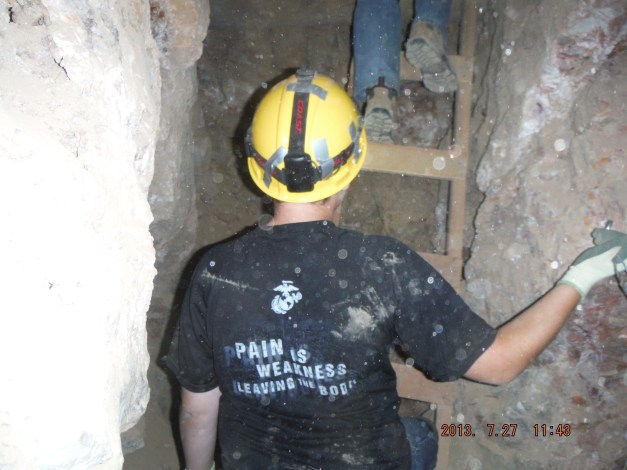 07-27 climbing up a ladder put there in the 1880s with square nails. Since these are dry mines the wood underground does not rot.