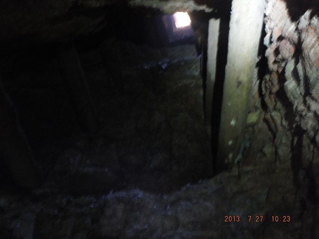 07-27 This is an air shaft dug from the bottom up there is no debris around the top of the hole. This one comes up in donkey corral on top.